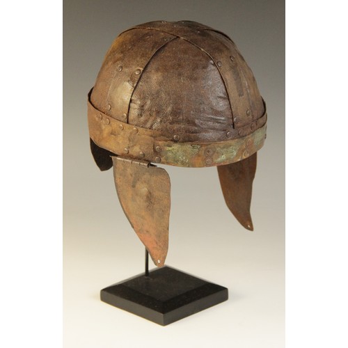 57 - A modern reproduction of a ‘Spangenhelm’ in the style of the 6th century AD, the skull constructed o... 