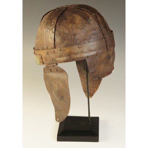 57 - A modern reproduction of a ‘Spangenhelm’ in the style of the 6th century AD, the skull constructed o... 