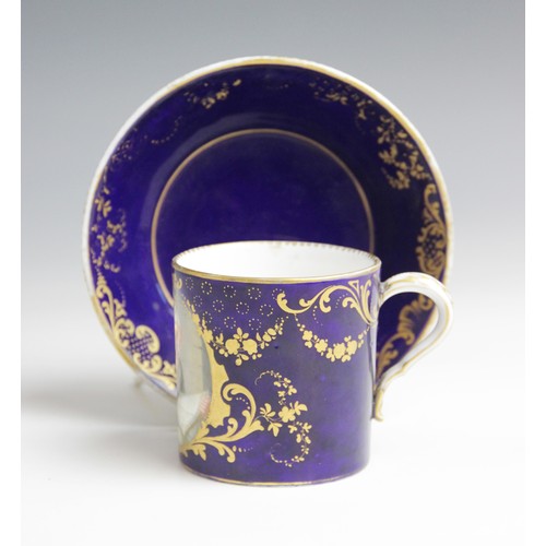 356 - A Sevres porcelain cup and saucer, 18th century, the straight sided cup with bleu lapis ground, fine... 