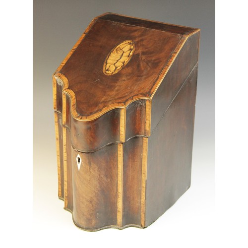 498 - A George III mahogany and satinwood cross banded knife box, of serpentine form,  the hinged cover in... 