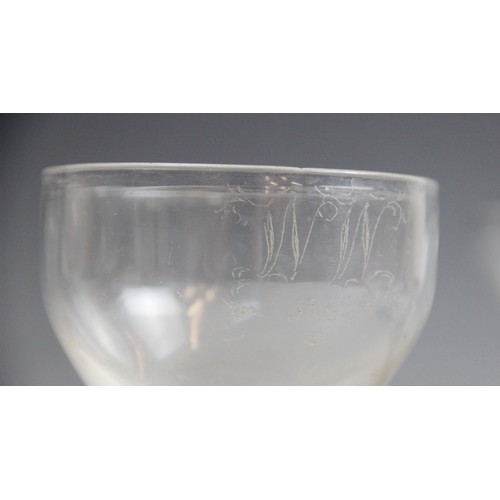 380A - A rummer, of typical form, the straight sided conical bowl naively engraved 'WW 1832', set on an ann... 