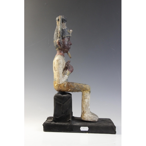 120 - An Egyptian style gesso painted seated wood figure of a pharaoh, wearing the atef crown, Not Ancient... 