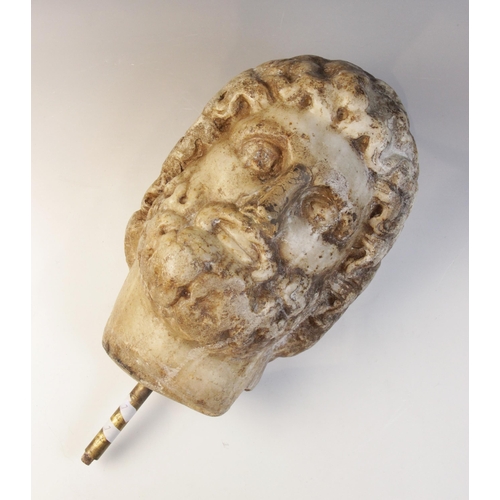 123 - A marble head of a bearded male with down-curved moustache, some deep drilling to the curled hair, 2... 