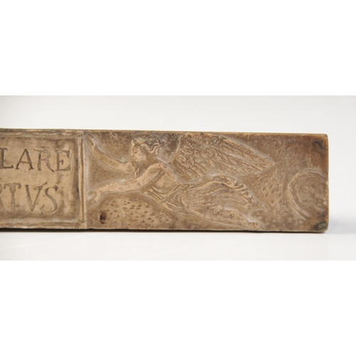 133 - A Giallo Antico square section rectangular relief with centrally engraved tabula supported by two wi... 