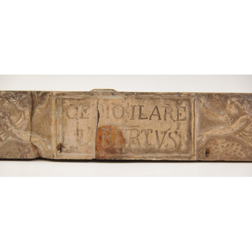 133 - A Giallo Antico square section rectangular relief with centrally engraved tabula supported by two wi... 