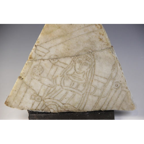 145 - A marble fragment, carved with a naiskos, an enthroned woman within, possibly representing the godde... 