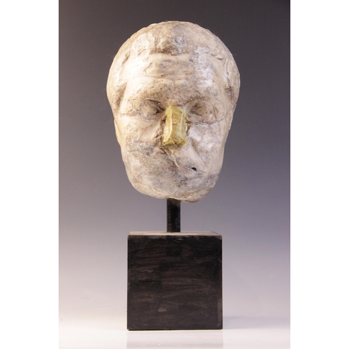 146 - A worn marble male head carved with furrowed brow, with restorations, height excluding base approxim... 