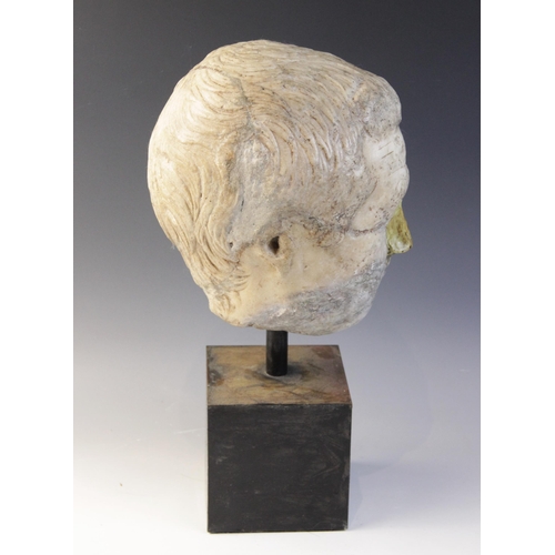 146 - A worn marble male head carved with furrowed brow, with restorations, height excluding base approxim... 