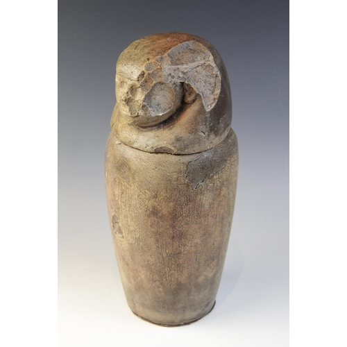 154 - An Egyptian style limestone canopic jar, the stopper in the form of human-headed Imsety, Not Ancient... 