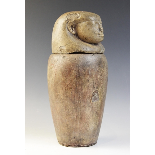 154 - An Egyptian style limestone canopic jar, the stopper in the form of human-headed Imsety, Not Ancient... 