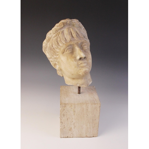 156 - A marble head of an emperor, probably Nero, wearing a wreath, After the Antique, 23.5cm high (at fau... 