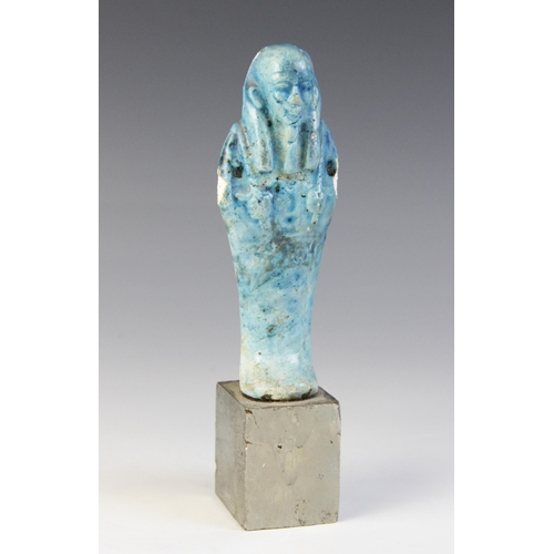 157 - An Egyptian style bright blue glazed faience shabti, 13cm high (at fault) 

Provenance: Ex Alison Ba... 