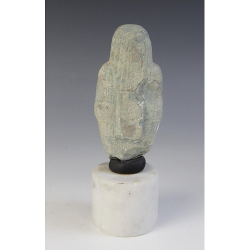 159 - A fragmentary Egyptian blue glazed faience shabti, holding a pick and a hoe, worn bands of horizonta... 