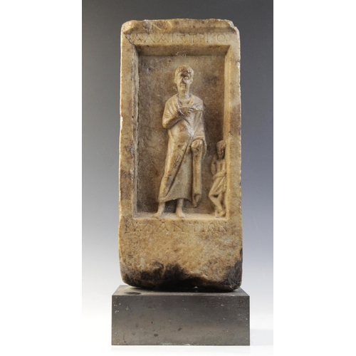 163 - A marble grave stele of rectangular form, the recessed area carved in relief with a standing male fi... 