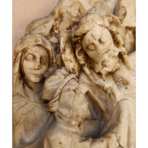 89 - A carved alabaster panel fragment, modelled in the 15th century Nottingham manner with a high relief... 