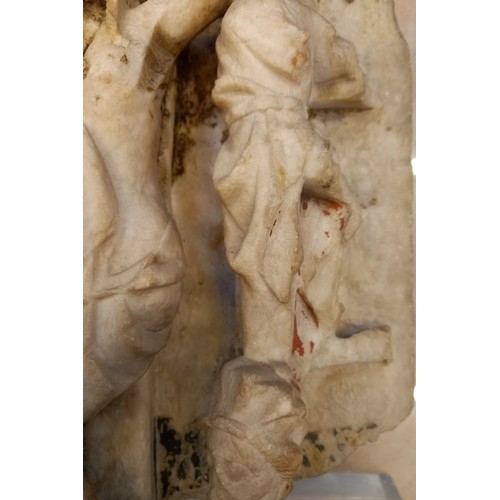 89 - A carved alabaster panel fragment, modelled in the 15th century Nottingham manner with a high relief... 