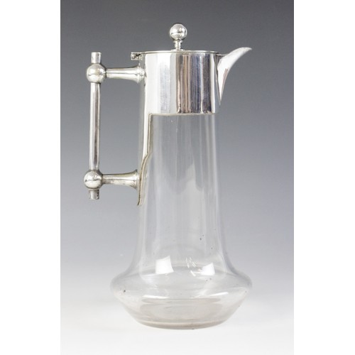 18A - A cut glass silver plated decanter in the manner of Christopher Dresser, of baluster form with cut b... 