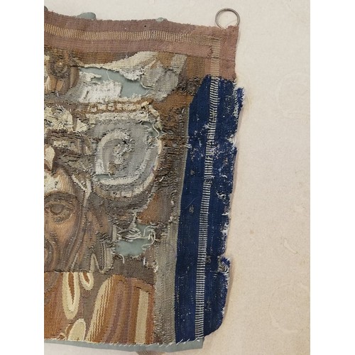 262 - An embroidery of a religious figure, possibly Saint Catherine, possibly 17th Century, comprised of c... 