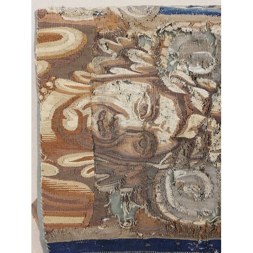 262 - An embroidery of a religious figure, possibly Saint Catherine, possibly 17th Century, comprised of c... 