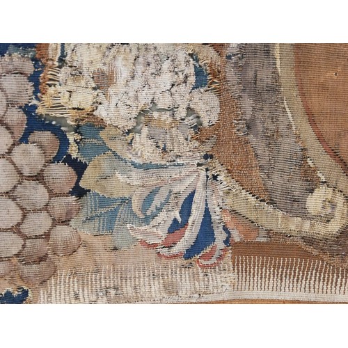 262 - An embroidery of a religious figure, possibly Saint Catherine, possibly 17th Century, comprised of c... 