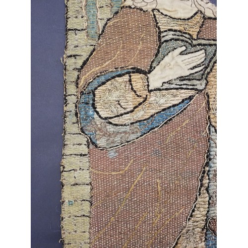 262 - An embroidery of a religious figure, possibly Saint Catherine, possibly 17th Century, comprised of c... 