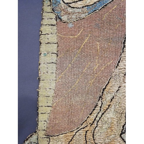 262 - An embroidery of a religious figure, possibly Saint Catherine, possibly 17th Century, comprised of c... 