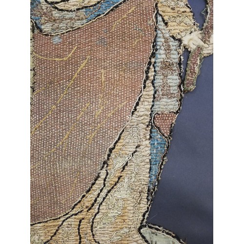 262 - An embroidery of a religious figure, possibly Saint Catherine, possibly 17th Century, comprised of c... 