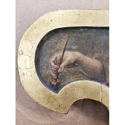 255 - Manner of Michelangelo (1475-1564),  
An artist at work on a Madonna And Child, 
Oil on shaped gilt ... 