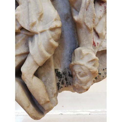 89 - A carved alabaster panel fragment, modelled in the 15th century Nottingham manner with a high relief... 