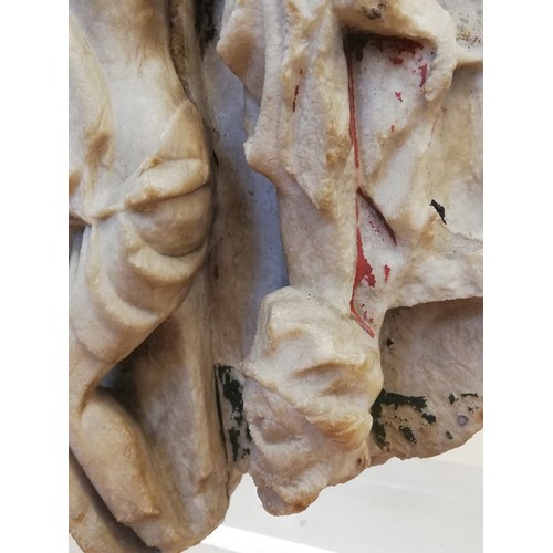 89 - A carved alabaster panel fragment, modelled in the 15th century Nottingham manner with a high relief... 