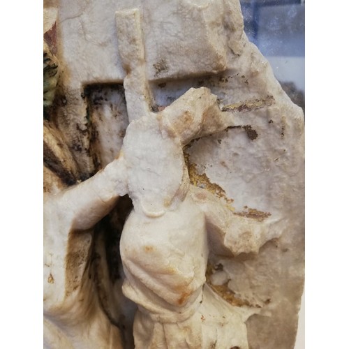 89 - A carved alabaster panel fragment, modelled in the 15th century Nottingham manner with a high relief... 