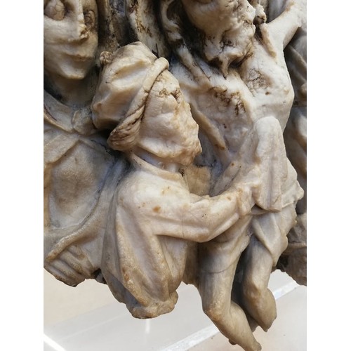 89 - A carved alabaster panel fragment, modelled in the 15th century Nottingham manner with a high relief... 