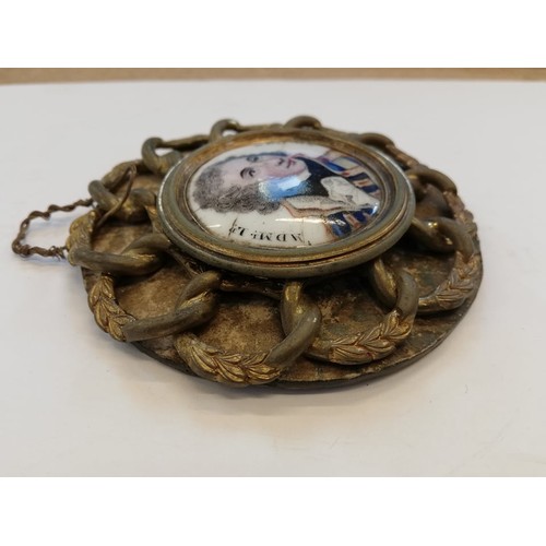 31 - NAVAL INTEREST: An enamel plaque depicting Admiral Lord Nelson, 19th century, the bust length portra... 