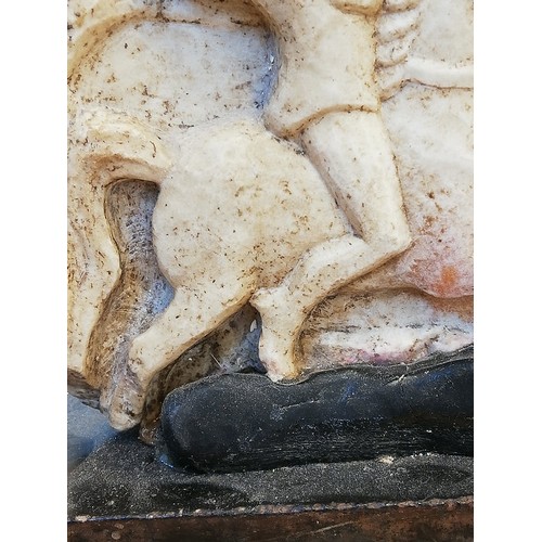 117 - A Roman marble stele carved in high relief with the 'Thracian horseman', the remains of what is like... 