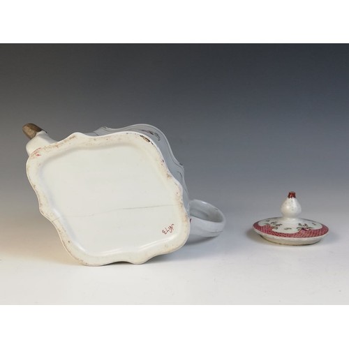 363 - A Worcester porcelain teapot circa 1780, decorated in a kakiemon design with alternating panels, the... 