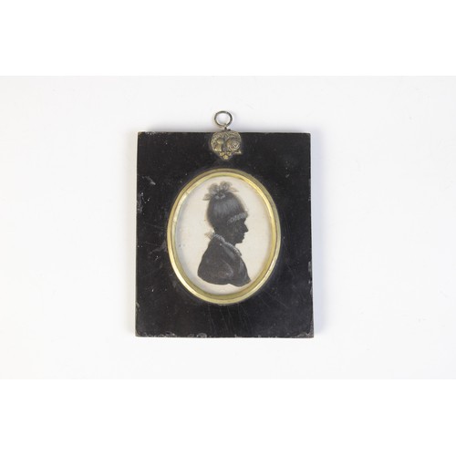 54 - A collection of twelve portrait silhouette miniatures, 19th century and later, variously framed, the... 