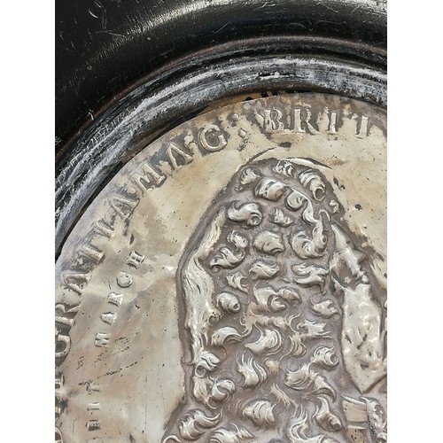 30 - A pair of silver coloured William & Mary commemorative plaques, 18th Century, depicting repoussé pro... 