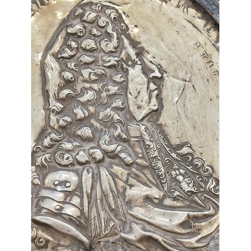 30 - A pair of silver coloured William & Mary commemorative plaques, 18th Century, depicting repoussé pro... 