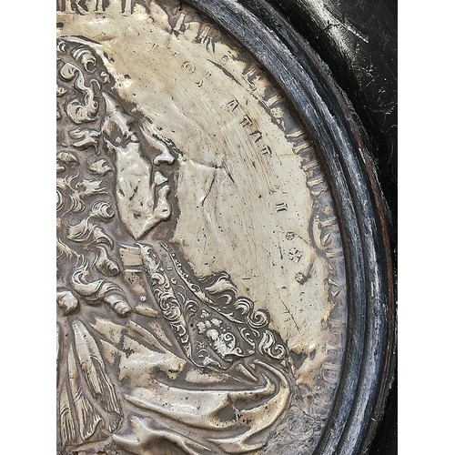 30 - A pair of silver coloured William & Mary commemorative plaques, 18th Century, depicting repoussé pro... 