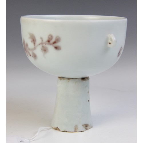 347 - * A Chinese porcelain stem cup, possibly Ming Dynasty, the iron-red decorated bowl painted to the ex... 