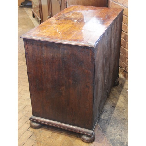 542 - A William and Mary figured walnut chest of drawers, the rectangular crossbanded top inlaid with cord... 