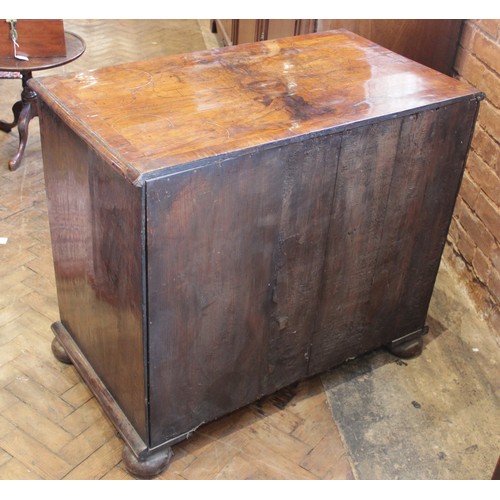 542 - A William and Mary figured walnut chest of drawers, the rectangular crossbanded top inlaid with cord... 