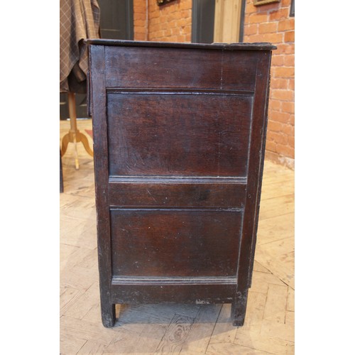 530 - A George II oak dresser base, the rectangular top with inverted front corners over three mahogany cr... 