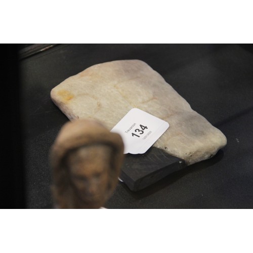 134 - A marble fragment, engraved with three letters, 12cm x 8cm (at fault) 

Provenance: Ex Alison Barker... 