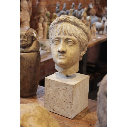 156 - A marble head of an emperor, probably Nero, wearing a wreath, After the Antique, 23.5cm high (at fau... 