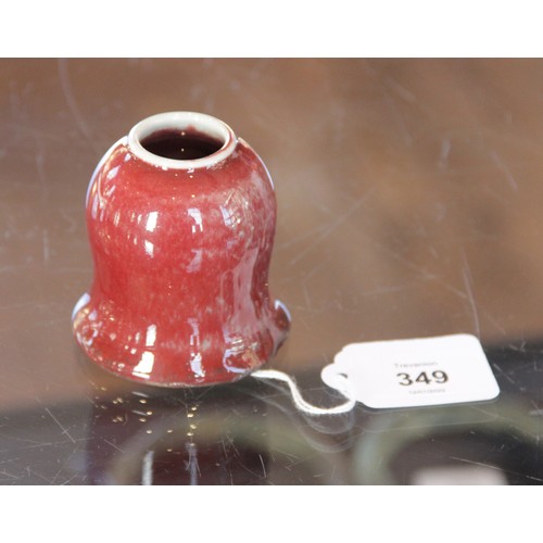 349 - * A Chinese flambe glazed sang de boeuf bitong, in the Qianlong manner, of bell shaped form, unglaze... 