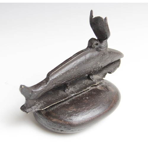 28 - An Egyptian style bronze Oxyrhynchus (medjed fish), modelled as a fish with horned headdress on an i... 