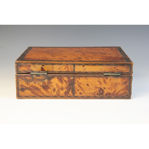 495 - A 19th century burr walnut tea caddy, of rectangular domed form, the hinged cover opening to a centr... 