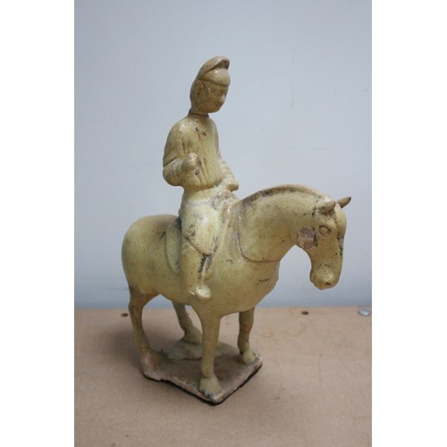 332 - Two Chinese straw-glazed equestrian groups, possibly Sui dynasty, each horse modelled on four legs r... 