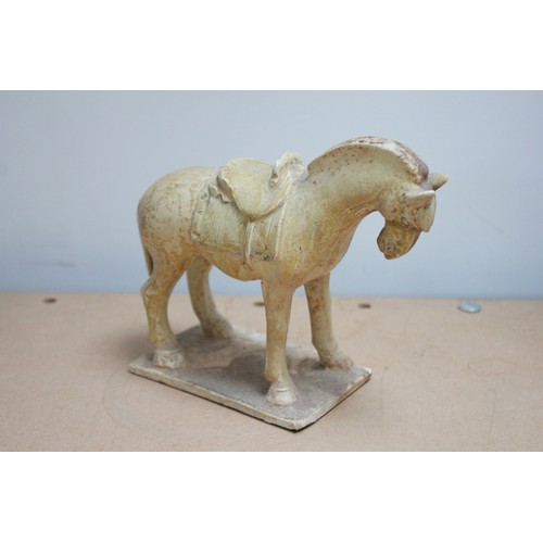 332 - Two Chinese straw-glazed equestrian groups, possibly Sui dynasty, each horse modelled on four legs r... 